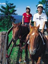 students riding horses