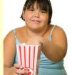 girl eating popcorn