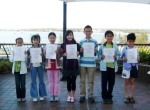 Students receiving English study certificate at AICOL