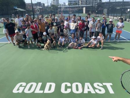 Students from various countries having fun making friends and learning to play tennis